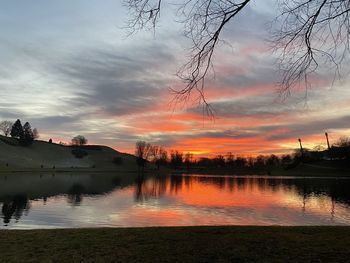 Scenic view of lake against sky during sunset