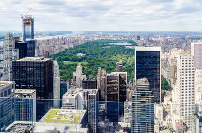 High angle view of buildings in city against sky