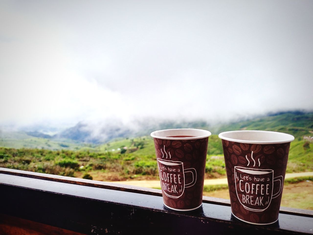morning, food and drink, drink, refreshment, cup, soft drink, nature, no people, sky, day, mug, coffee, fog, hot drink, copy space, food, outdoors, green, environment, window, landscape, mountain, tea, cloud