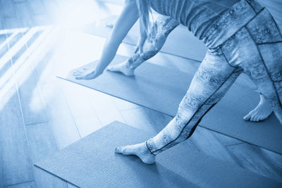 Low section of woman standing on floor