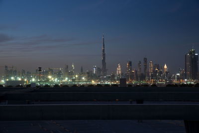 Illuminated buildings in city at night