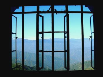 View of landscape through window