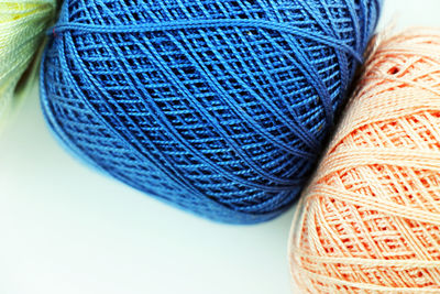 Close-up of multi colored wools on table