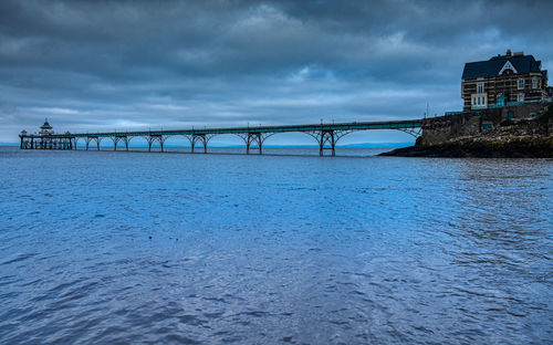 Bridge over river against sky