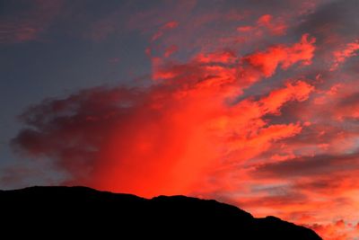 Low angle view of dramatic sky during sunset