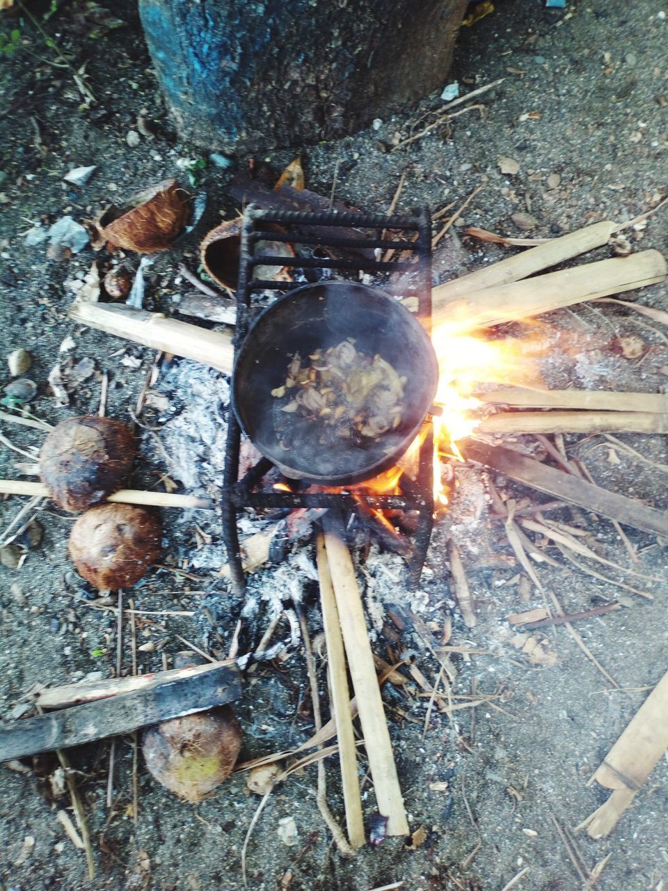 CLOSE-UP HIGH ANGLE VIEW OF BURNING OUTDOORS