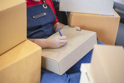 Rear view of a man with woman sitting on table