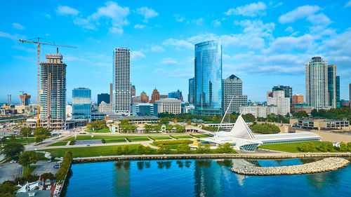 Buildings in city against sky