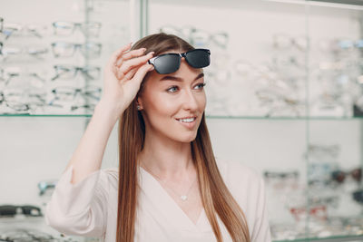 Young woman wearing sunglasses