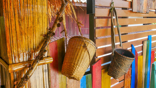 Close-up of clothes hanging on wood