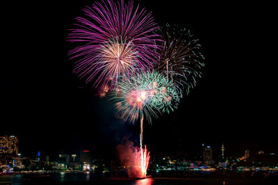 Firework display at night