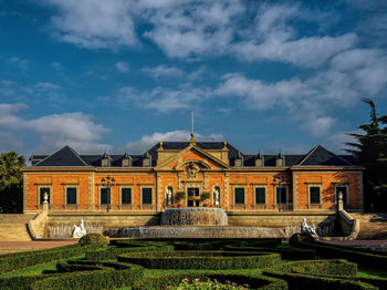 Building against cloudy sky