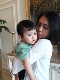 Mother and daughter at home
