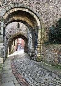 Footpath amidst old building