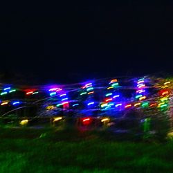 Light trails on illuminated city at night