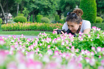 Woman using mobile phone outdoors