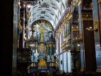 Statue in illuminated cathedral