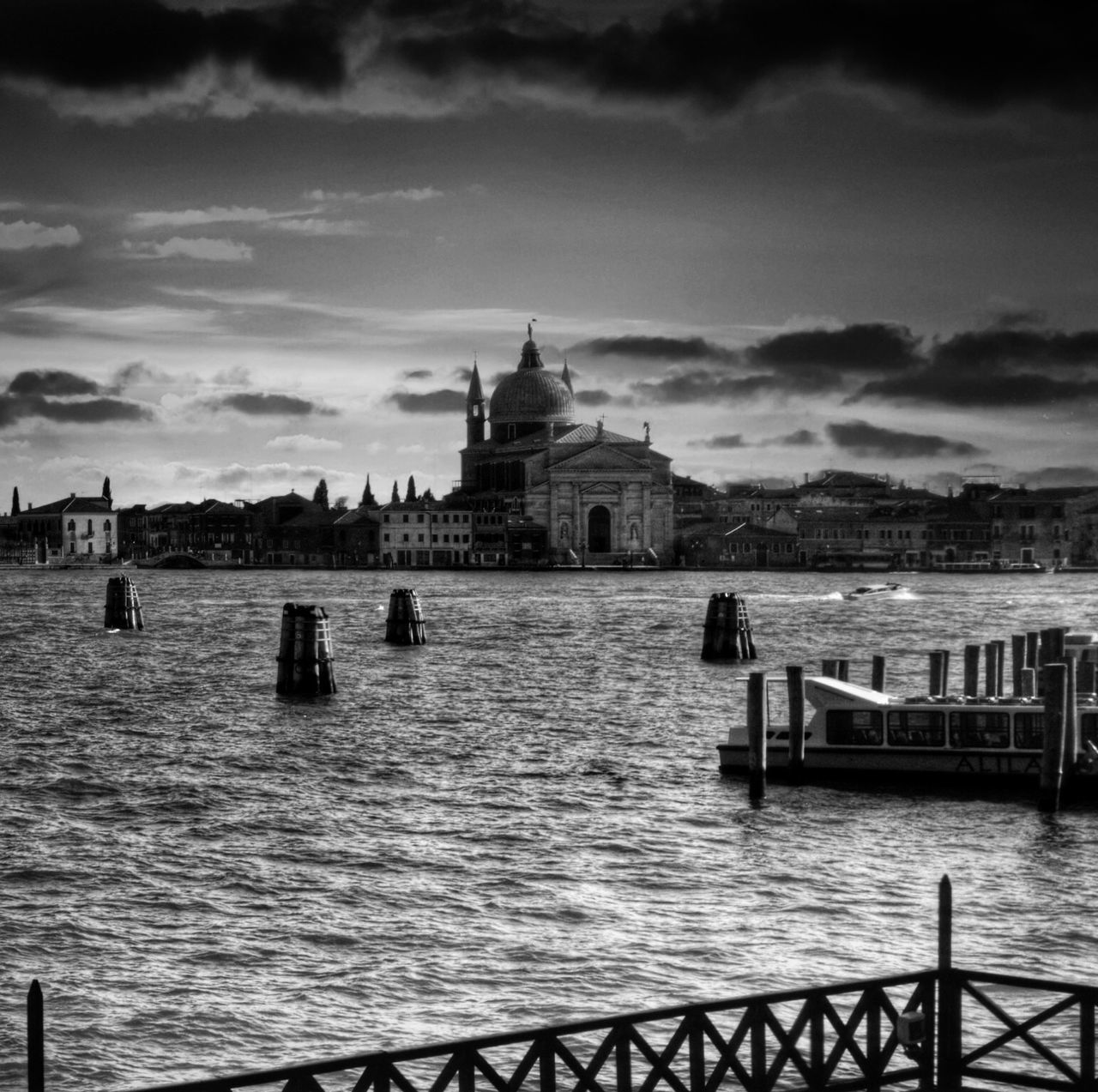 architecture, built structure, building exterior, place of worship, religion, spirituality, sky, water, famous place, church, travel destinations, tourism, travel, cathedral, cloud - sky, international landmark, river, dome