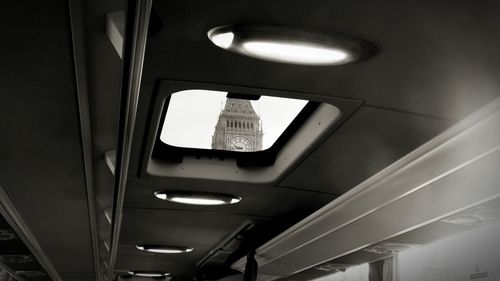 Low angle view of illuminated ceiling