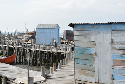 Stilt structures against the sky