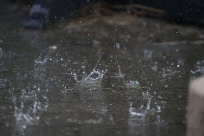 Close-up of water splashing in lake