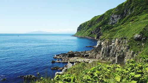 Scenic view of sea against clear sky