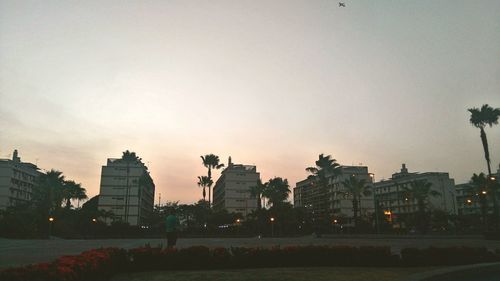 Illuminated buildings in front of buildings