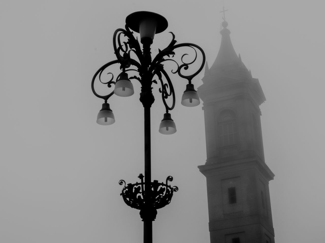 LOW ANGLE VIEW OF STREET LIGHT AND BUILDING AGAINST SKY