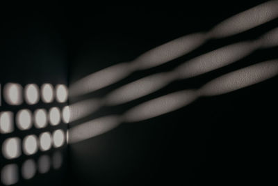 Close-up of hand holding illuminated lamp