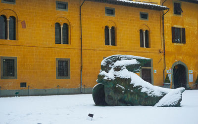 Snow covered residential building in winter