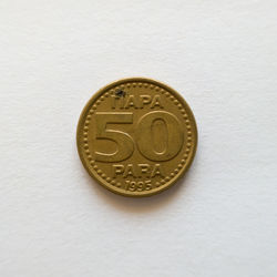 Close-up of coins on white background