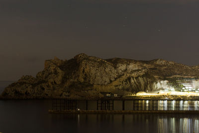 Scenic view of sea against sky at night