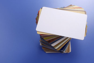 Close-up of books against blue background