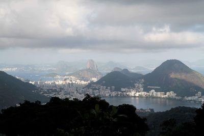 Scenic view of bay against sky