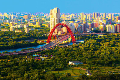 High angle view of bridge and buildings against sky