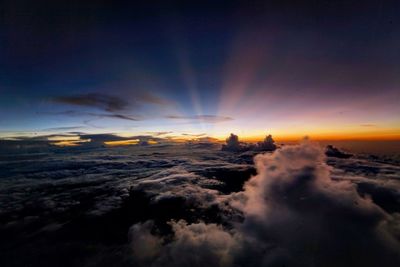 Scenic view of sea against sky at sunset