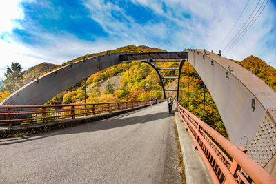 Bridge over river against sky