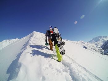 Ski skiing on snow covered mountain