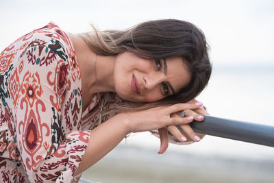 Portrait of young woman looking away