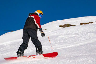 Snowboarder on a ski slope