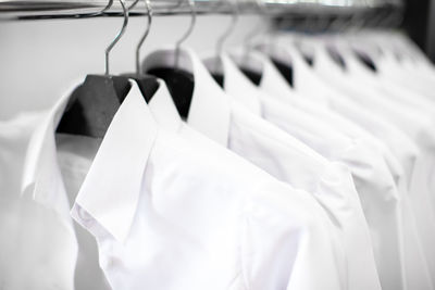 Close-up of piano hanging in rack