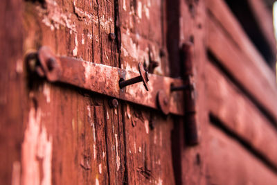 Close-up of rusty door of abandoned house