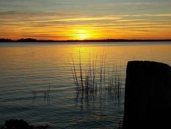 Scenic view of sunset over sea