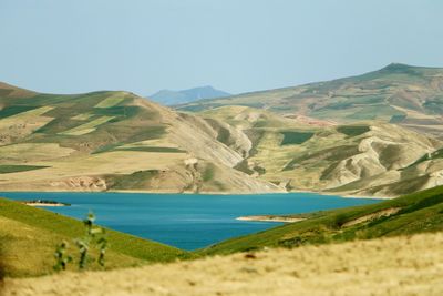 Scenic view of landscape and mountains against clear sky in middle eastern