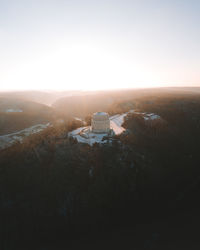 High angle drone photo view of monument on a hill against clear sky