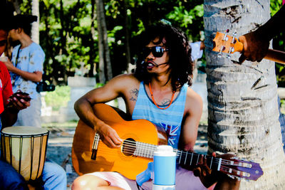 Young man playing guitar