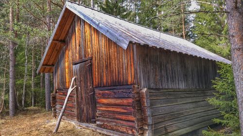 Wooden structure against trees