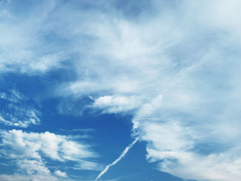 Low angle view of vapor trail in sky