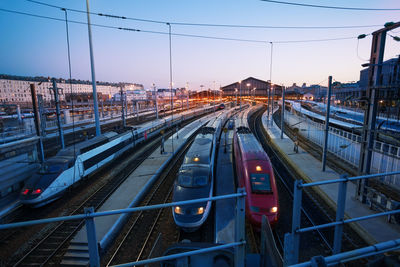 High angle view of train against sky at sunset