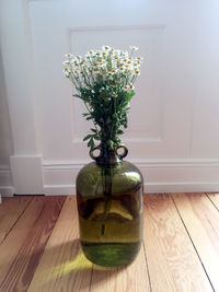 Close-up of vase on table at home
